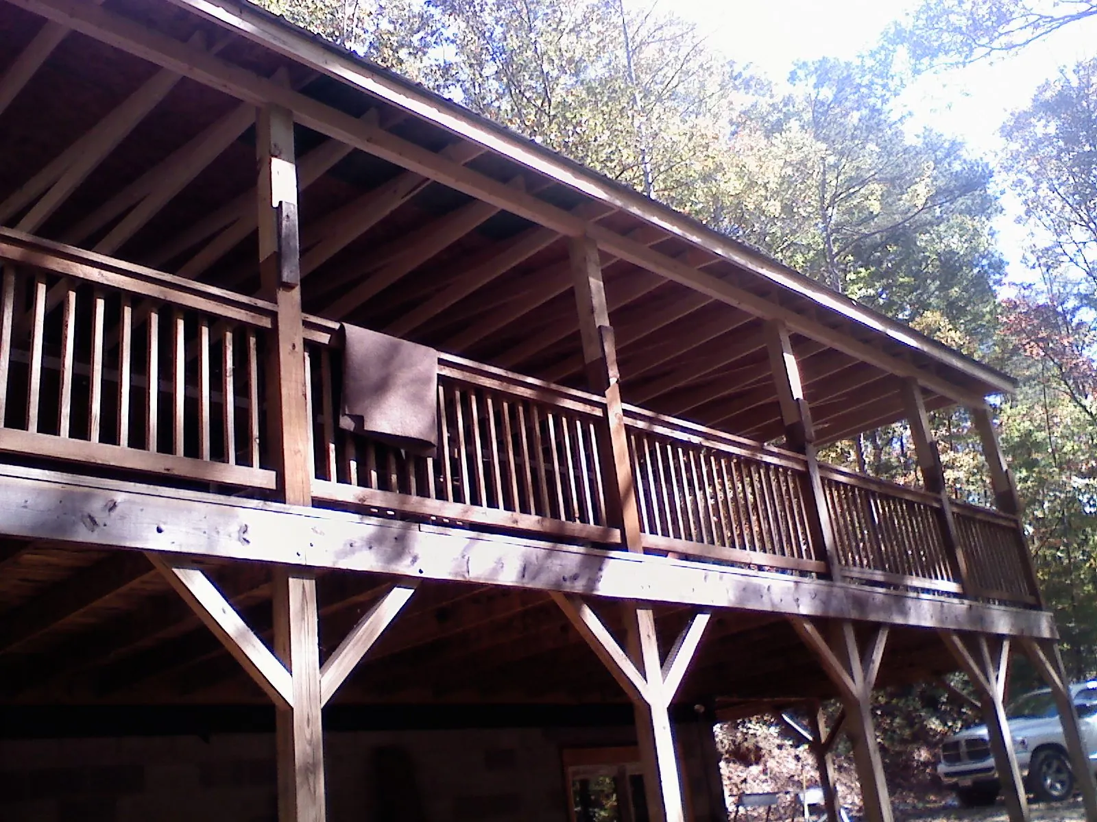 Timber framing under a new elevated porch and deck — Roof Leak Repair in Queen Creek by Roofing Brothers